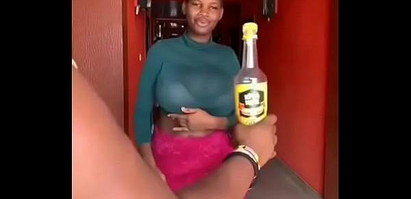  GHANA GIRL OPENS A BOTTLED DRINK WITH HER BREASTS